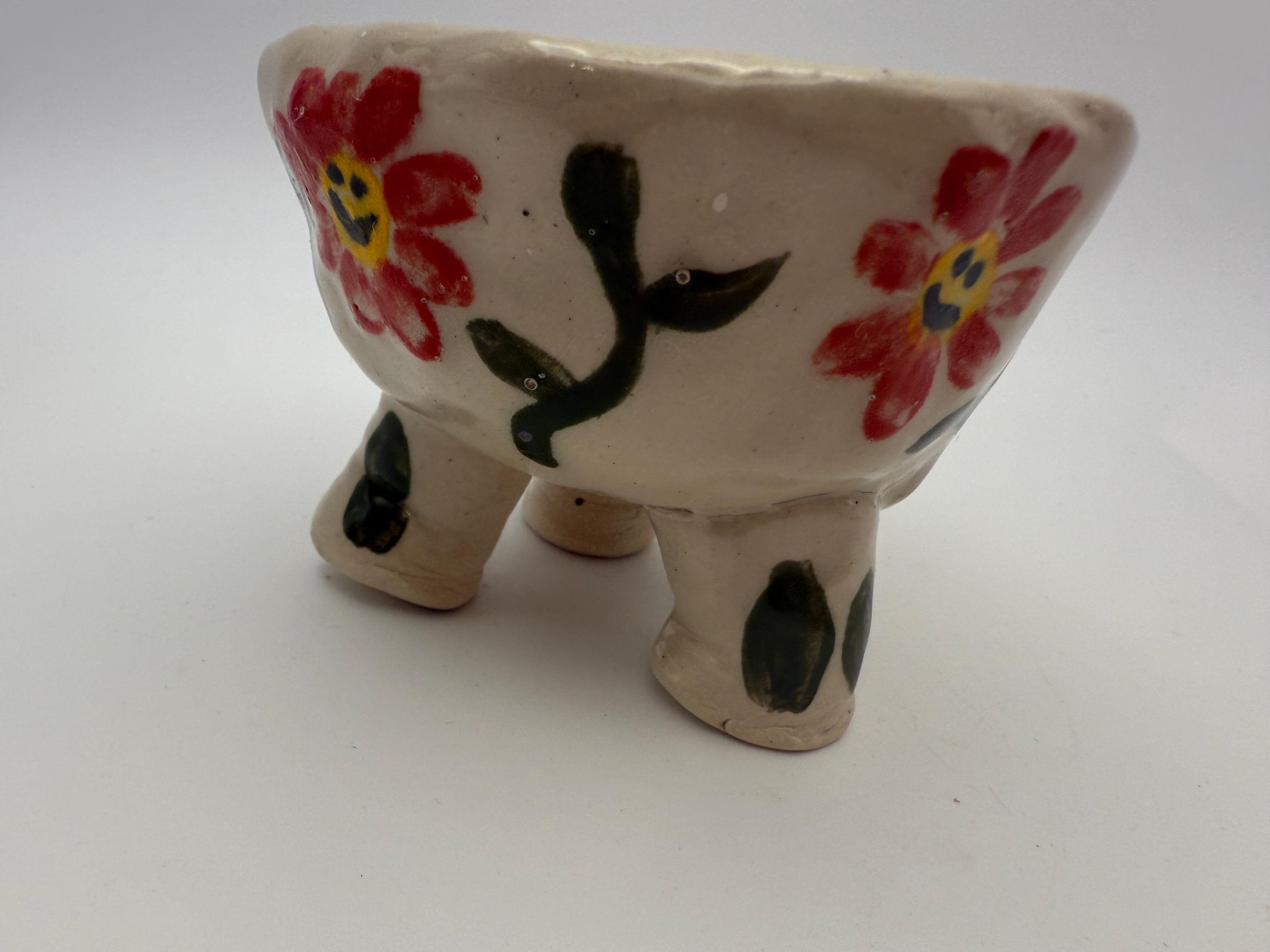 Flower three legged bowl.