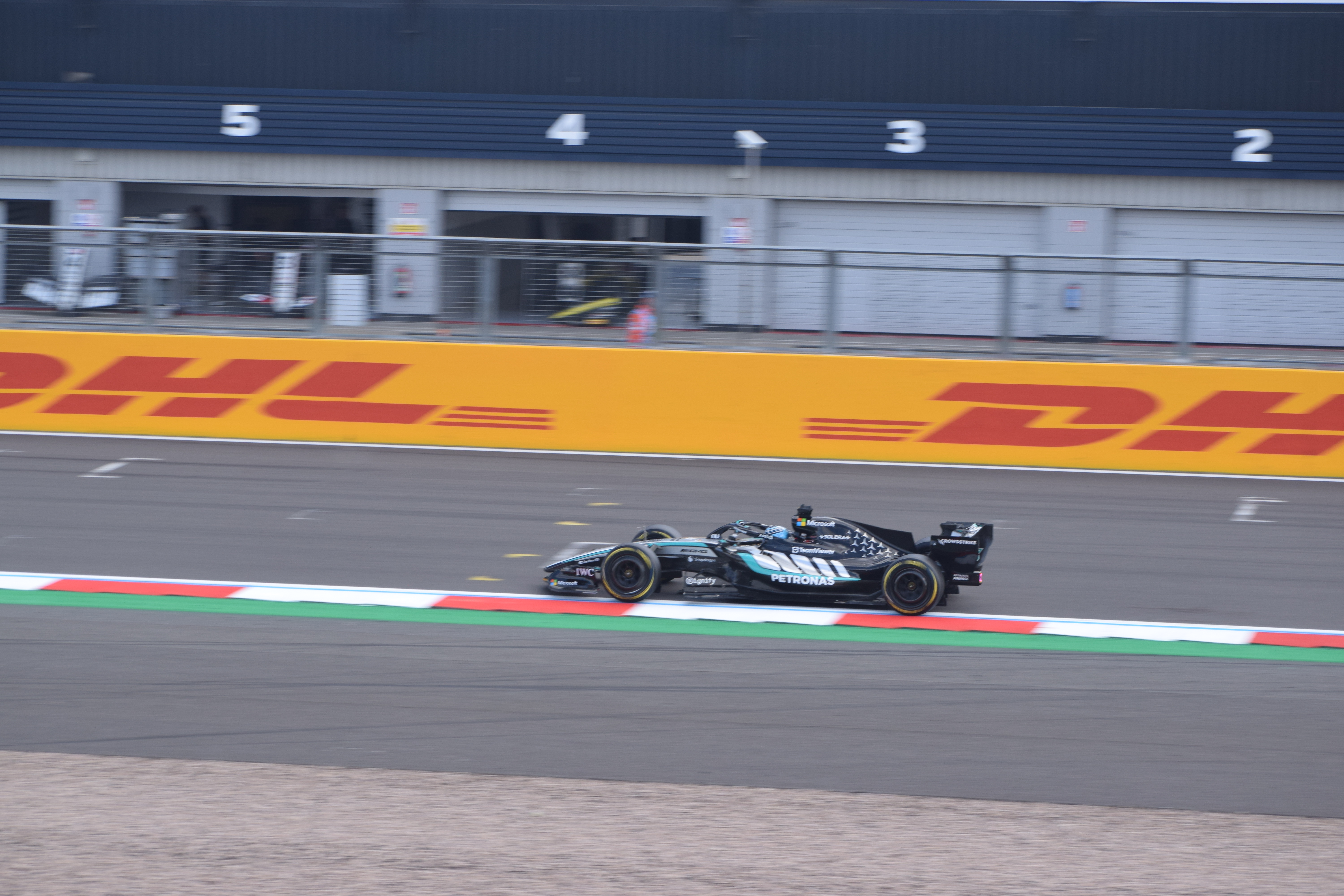 George Russell driving a silver and black Mercedes Formula 1 car at Silverstone in 2026