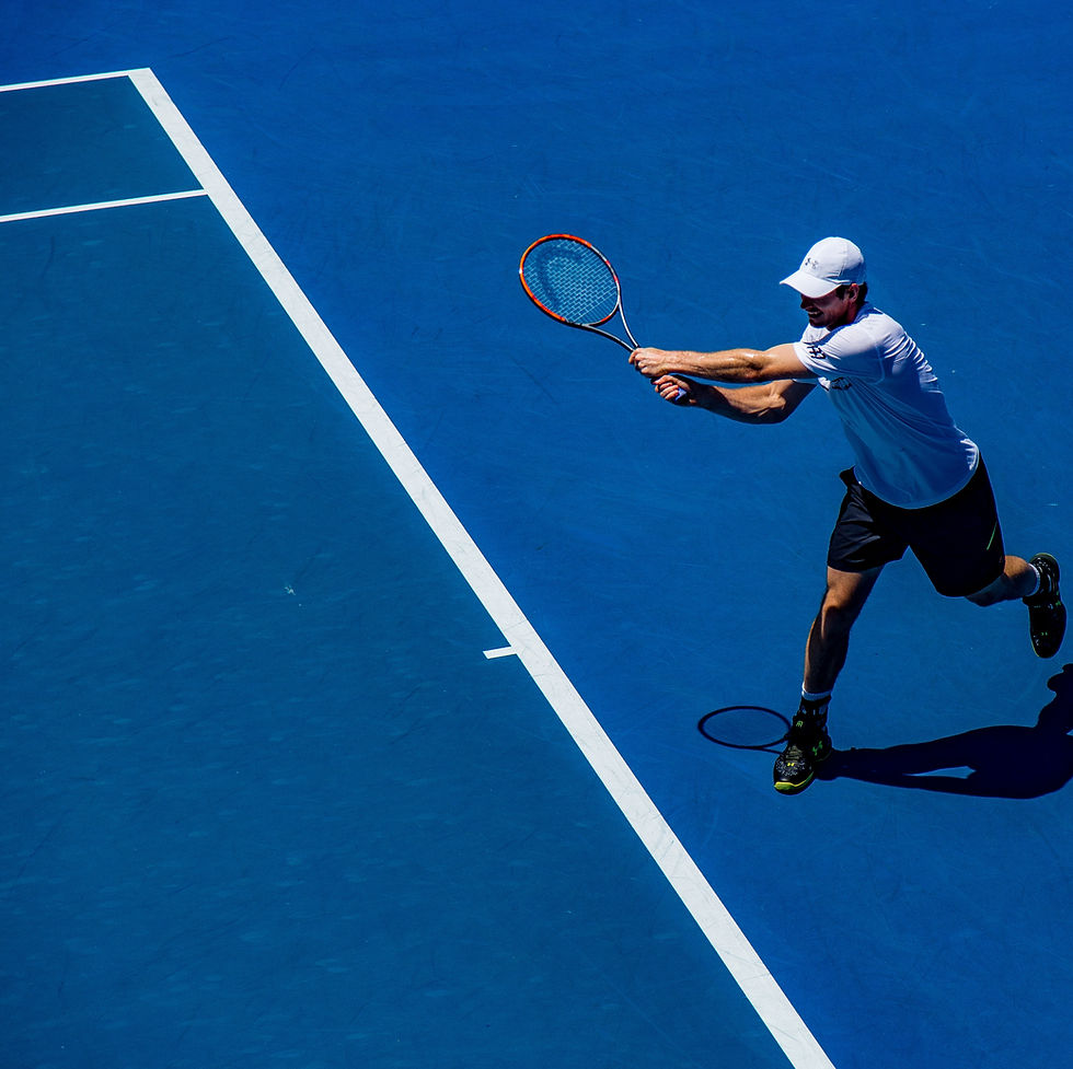 A tennis player with good backhand technique - similar to the players at Tennis Matters in Balwyn North, Melbourne