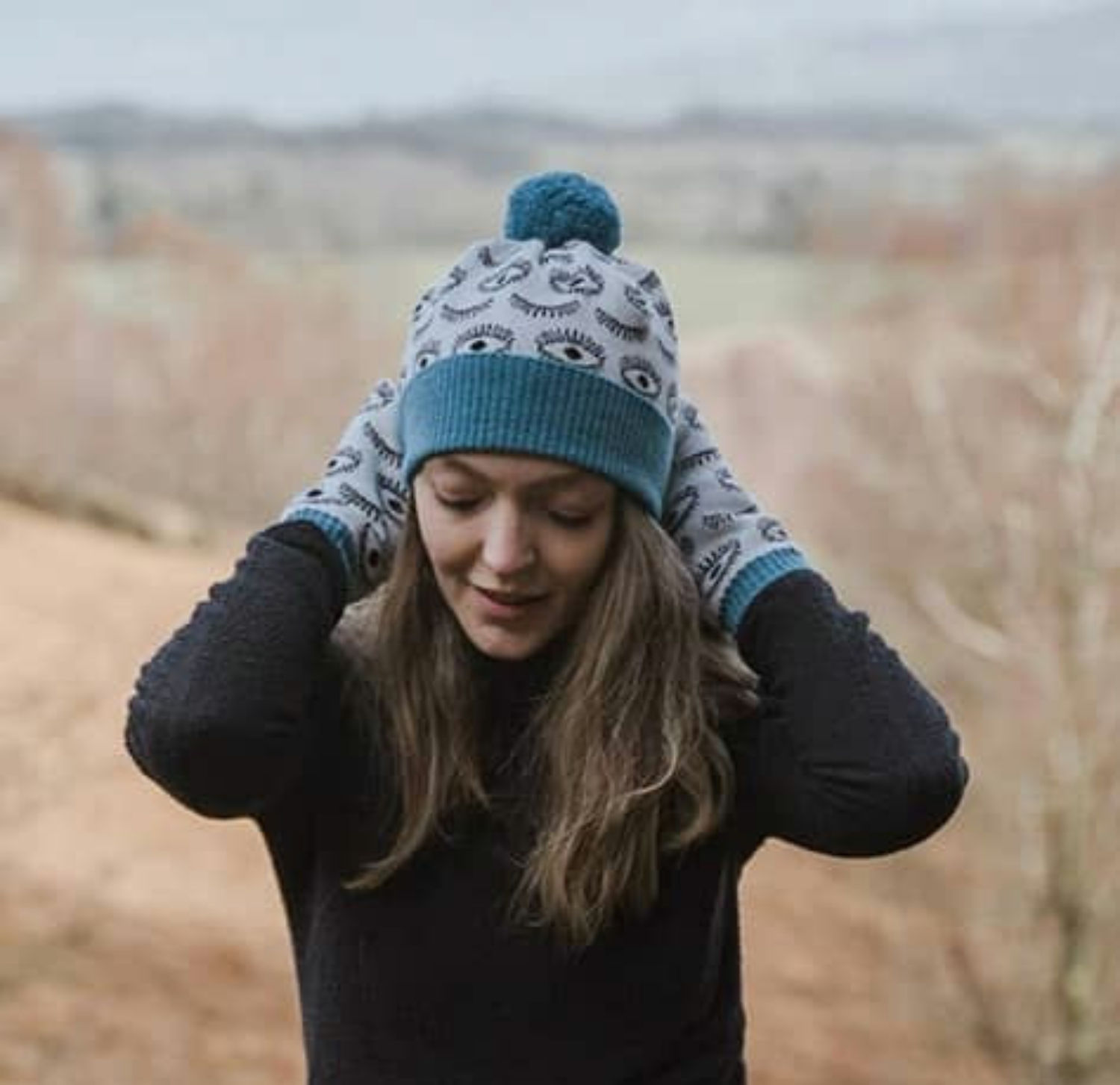 Eye spy pompom hat in hebridean blue 