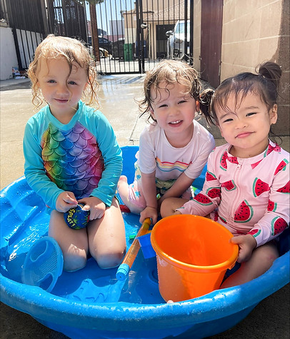 kids at Susanna Wesley Children's Center logo