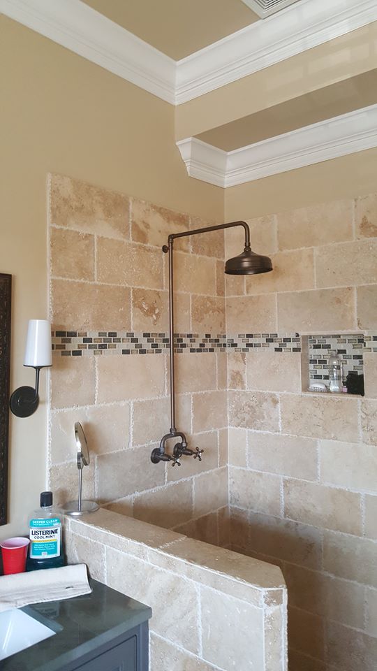 Travertine and tile shower