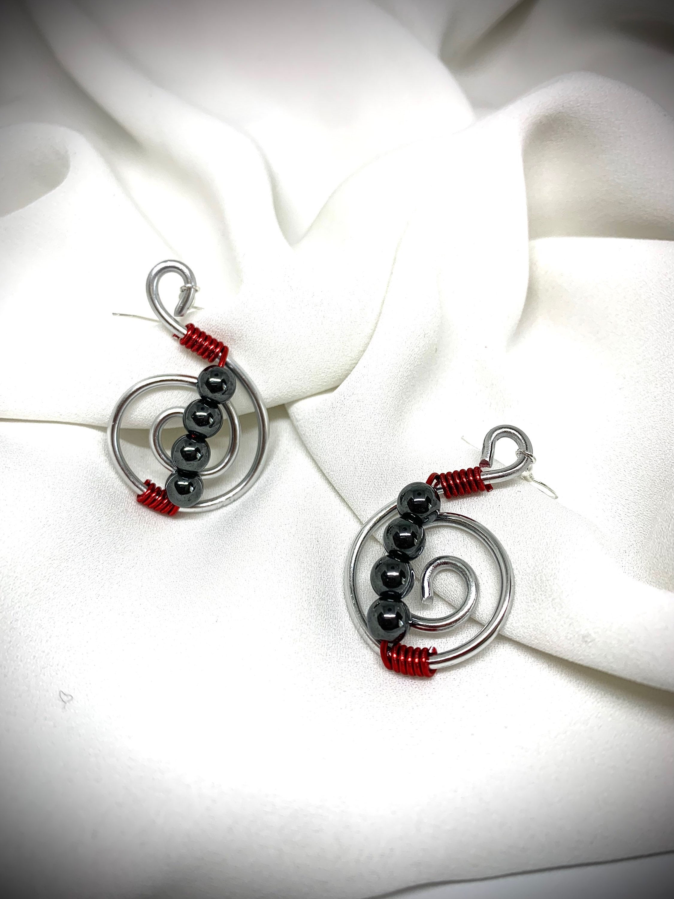 Boucles d’oreilles de la raison