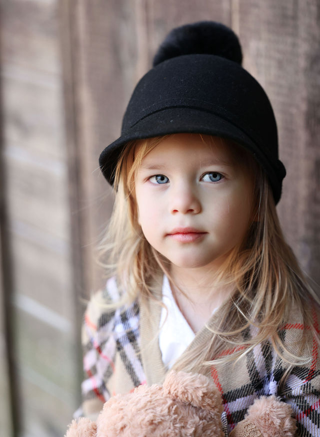 Little girl in a black hat and plaid coat, outdoor family photography by Photoholic, Rockland County NY