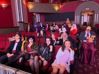 Rocky Horror live shadow cast in costume sitting in the seats at Richey Suncoast Theatre