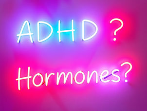 A neon sign that says ADHD? Hormones?