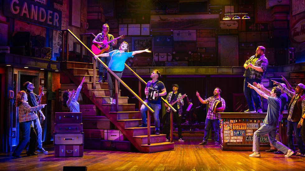 Maura Vincent (on stairs) and the company of the La Mirada Theatre for the Performing Arts and McCoy Rigby Entertainment production of “COME FROM AWAY,” directed and choreographed by Richard J. Hinds and now playing at La Mirada Theatre for the Performing Arts.