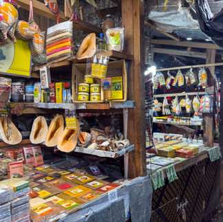vendors sell spices at the market