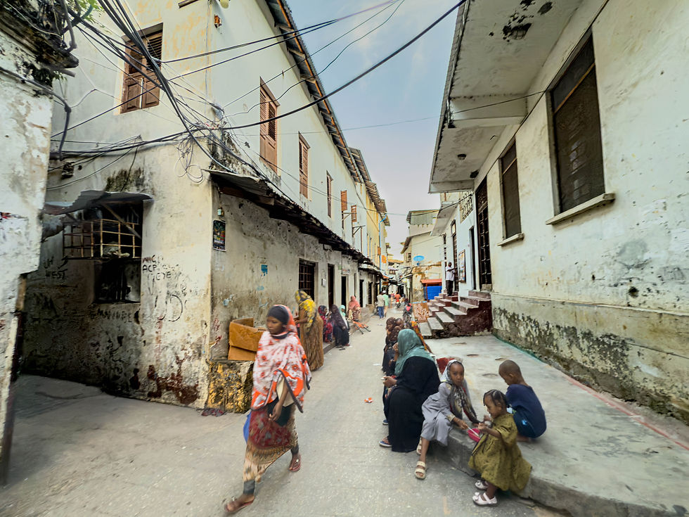 locals walking through stone town