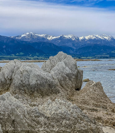 Armers Beach, Kaikoura looking towards the Seaward Kaikoura Mountain Range and Mount Manakau