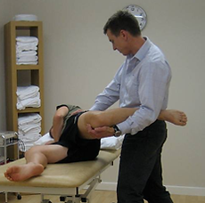 Physiotherapist Graham Theobald treating a physiotherapy patient