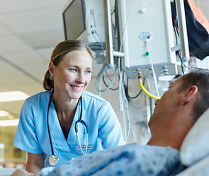 Nurse Assisting Patient