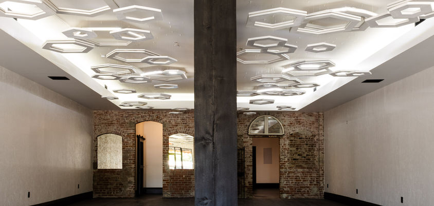 A casual dining restaurant proposed in one of Redding's oldest buildings. We designed a beautiful modern space to complement the existing brickwork and added a eye-catching suspended hexagonal lighting component. 