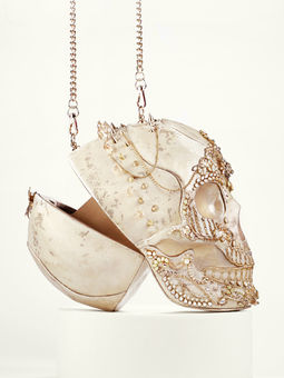Open view of Uma Skull Clutch Bag in Ivory revealing spacious interior, with Gold Zardozi embroidery and crystals by Chrysalis Couture.