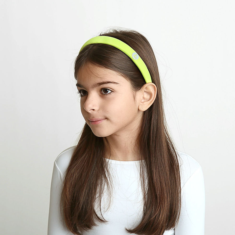 Spacer mesh sports headband worn by a girl, featuring breathable mesh fabric designed for sports, camp and activewear