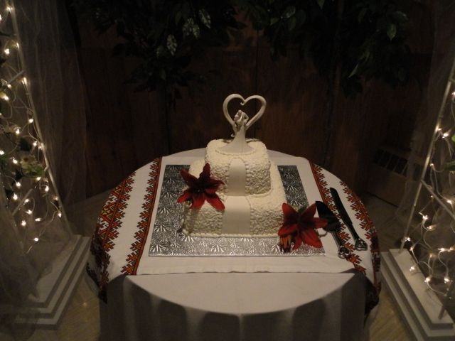 parties by pat 2 tier wedding cake.jpeg