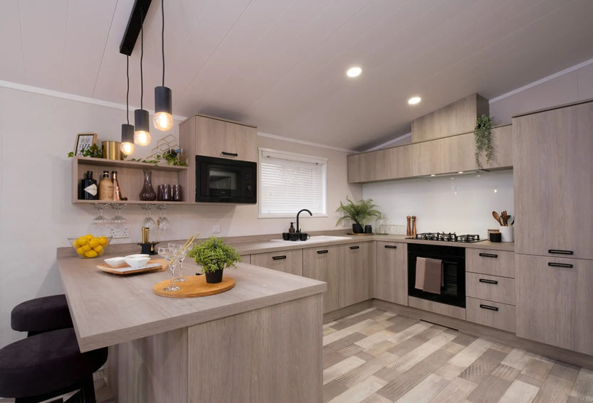 Modern kitchen area with integrated appliances
