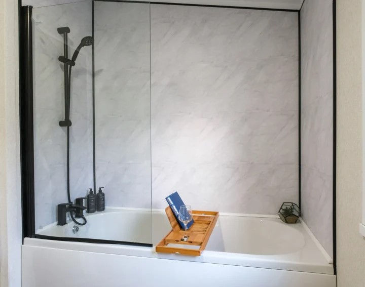 Bathroom with full bath and shower