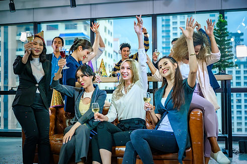 a-group-of-business-people-holding-a-glass-of-cham-2023-11-27-05-21-16-utc.jpg