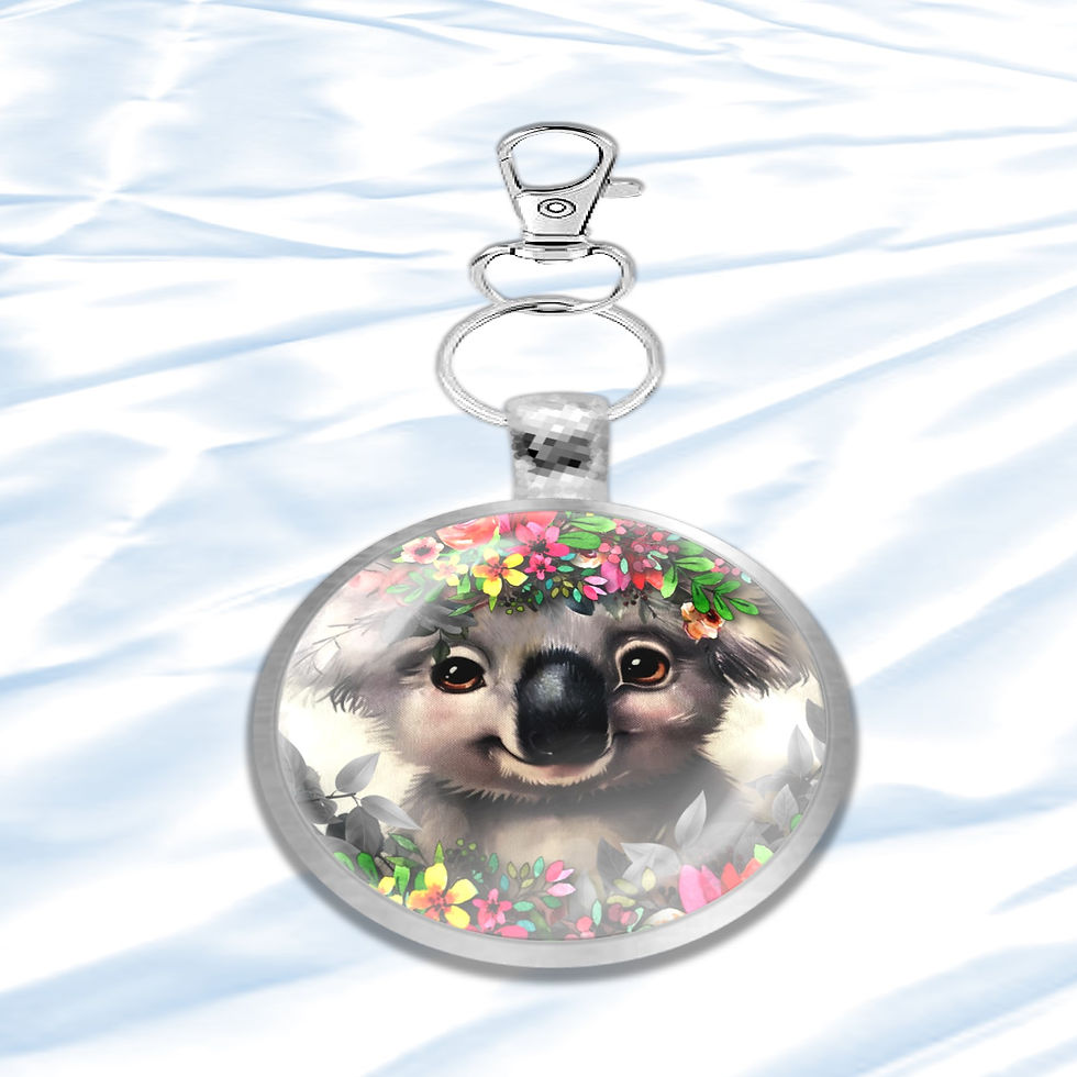 Thumbnail: Koala bear pendant with floral detail on a white snowy background. KCM Gifts4You