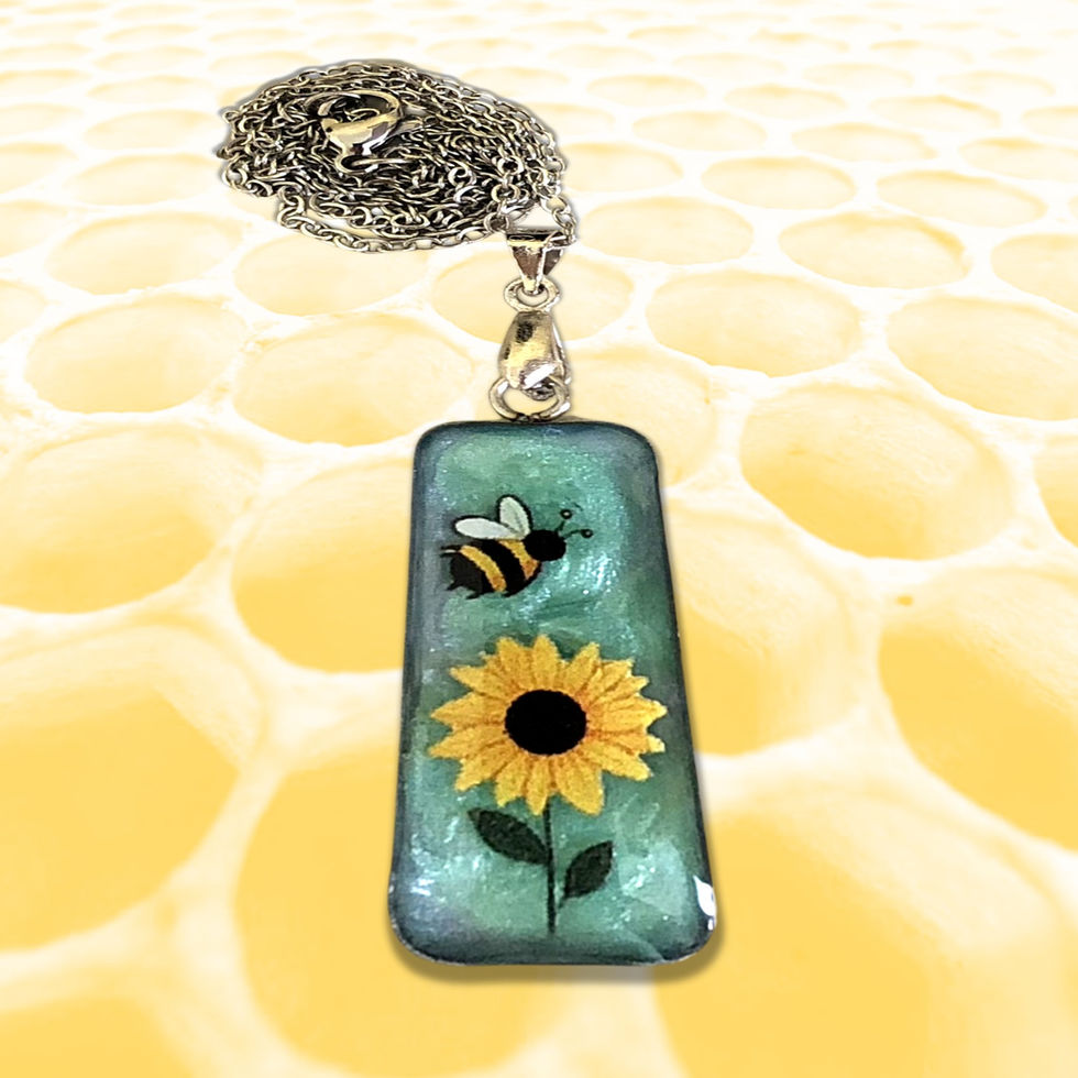 Honeybee, sunflower embellishments on green pearlescent resin silver pendant