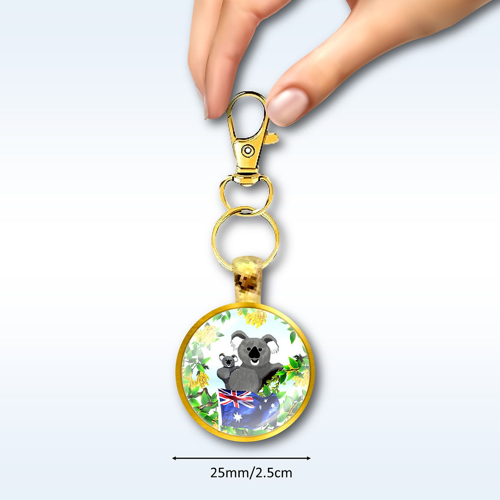 Thumbnail: Hand holding Koala keychain with Metallic Rainbow Swivel Clasp and Keyring with Book Flower Charms