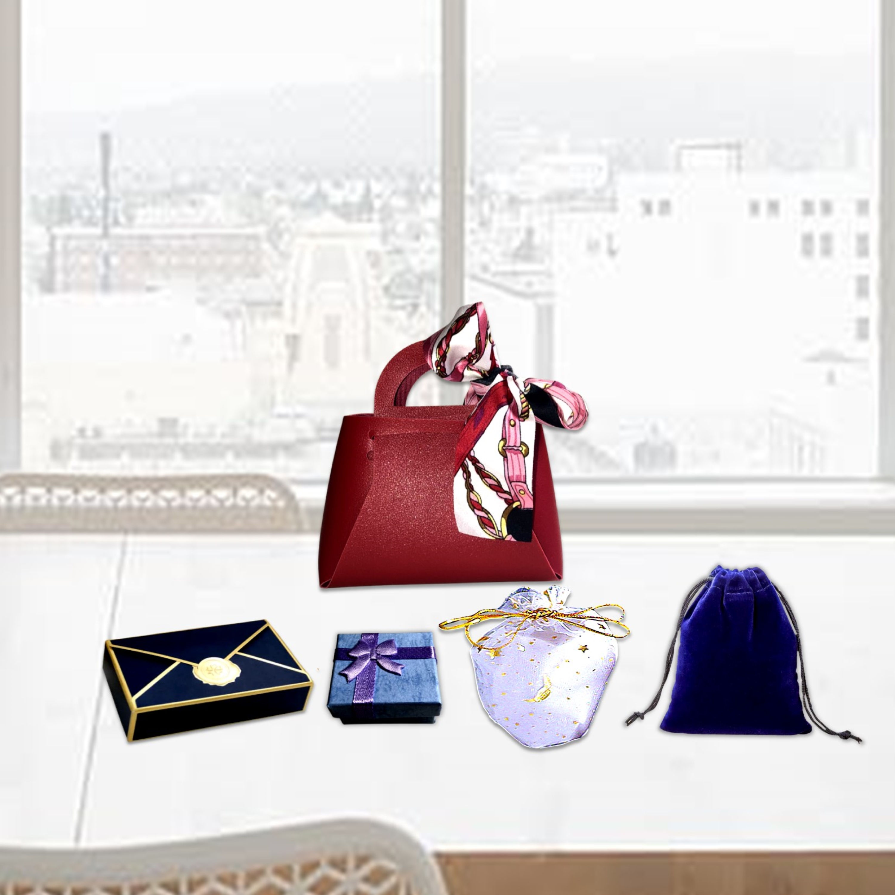 Various gifts on white table Red Faux Leather Gift Bag near window KCM Gifts4You