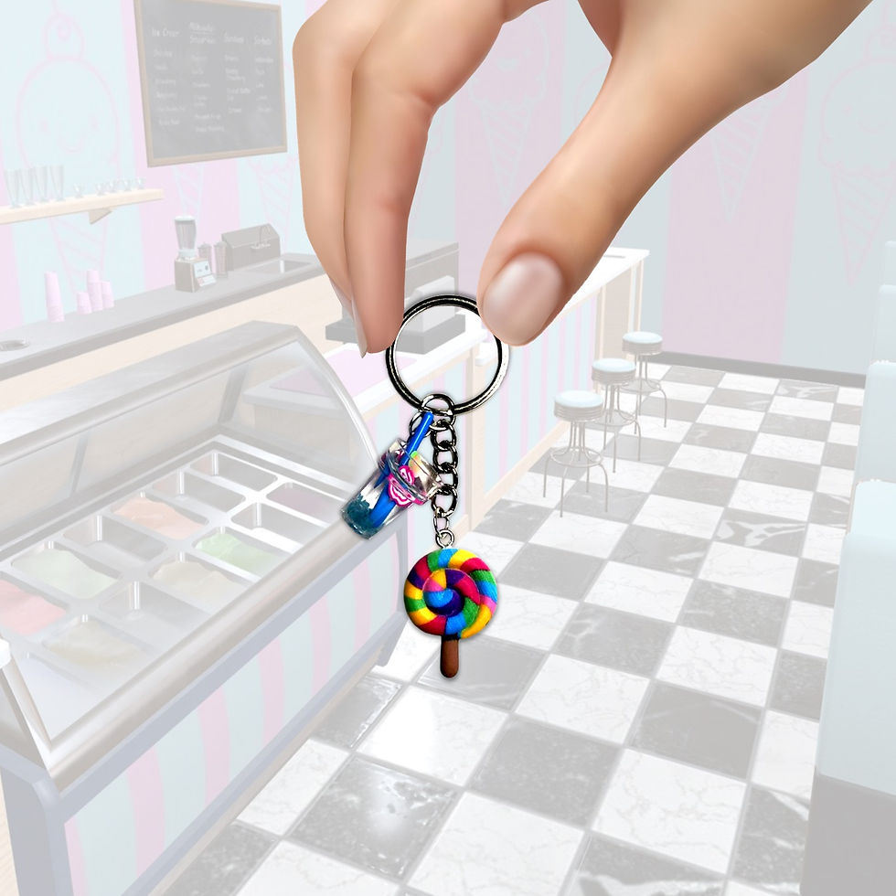 Thumbnail: Hand holding a colorful keychain with silver metal ring and charm details. KCM Gifts4You