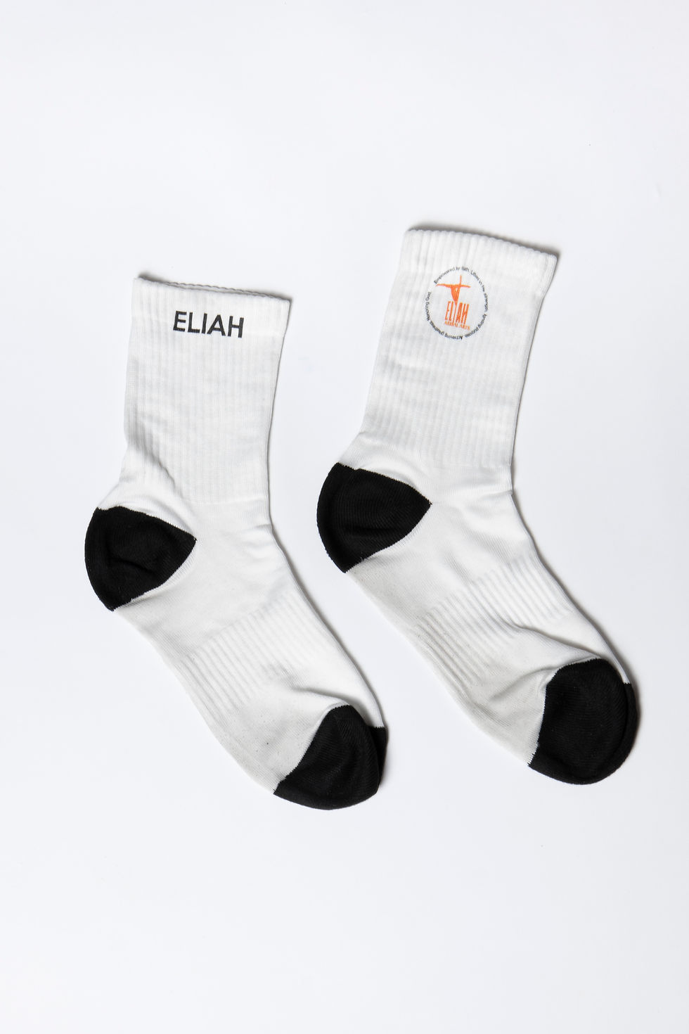 Thumbnail: Elysian Socks with ribbed arch and black heel/toe, handmade in London. Shown standing and folded flat. Breathable 100% cotton