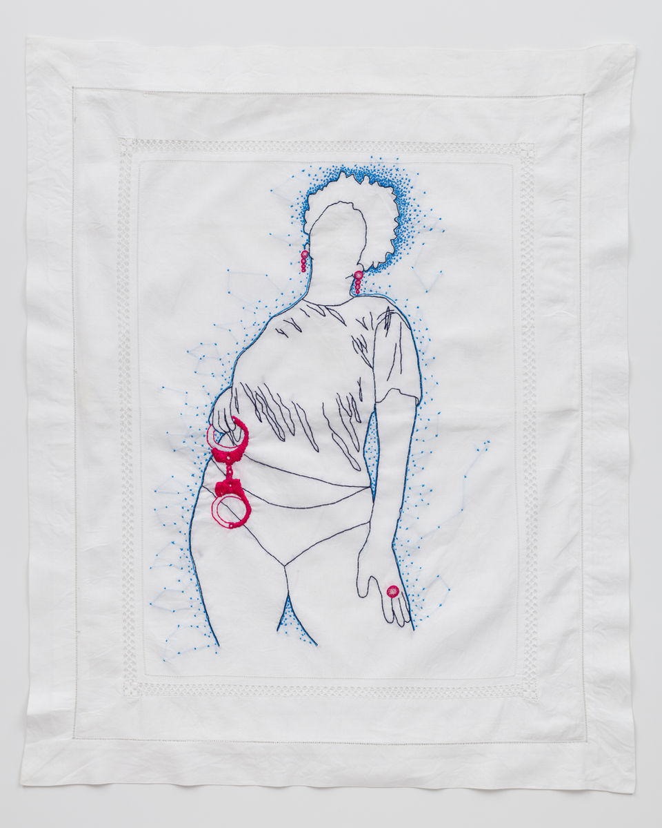 Hand embroidery on linen pillow sham.