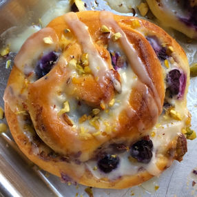 Rolls de Arándanos y Pistachos con Chocolate Blanco