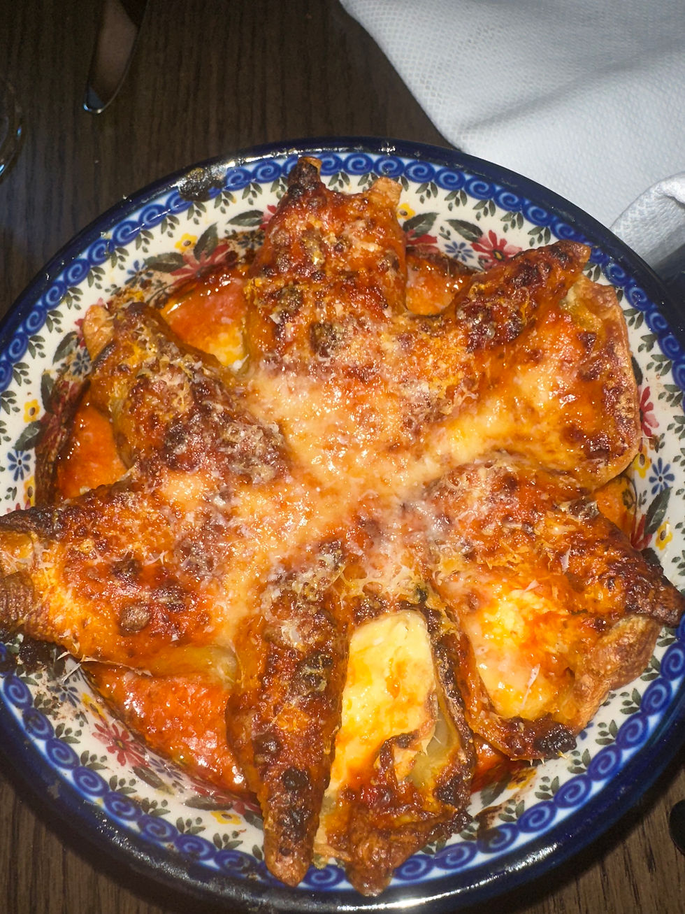 Spicy Vodka Stuffed Shells with ricotta, pecorino, and Calabrian chili at Dimmi Dimmi Chicago.