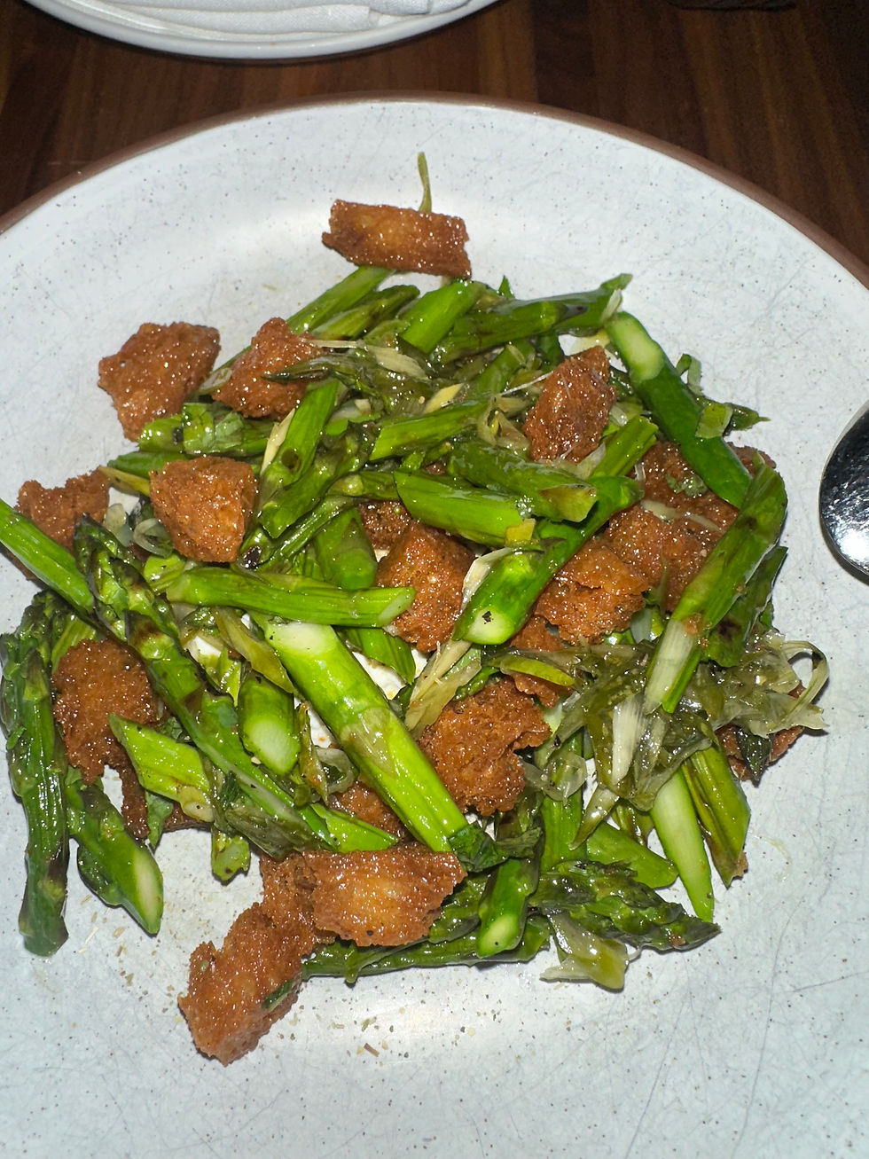 Asparagus Panzanella with cottage cheese and sourdough croutons.