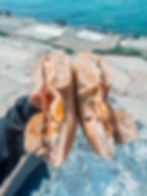 he Smooth Criminal bagel sandwich with goat cheese, egg, bacon, fig jam, Monterey jack cheese, basil, and sriracha on a jalapeno cheddar bagel, served at Hero Coffee and Bagel Bar.