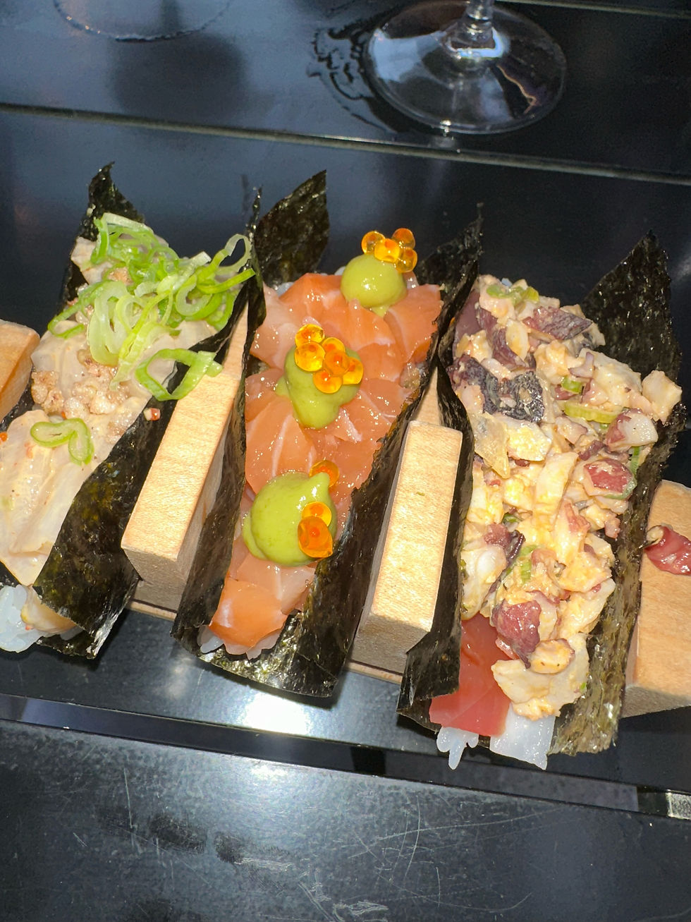 Trio of hand rolls at Itoko: tuna, scallop, and salmon.