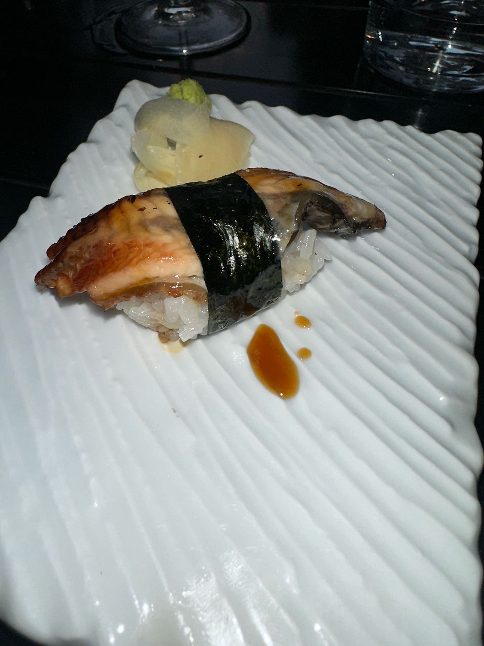 Unagi nigiri sushi close-up at Itoko restaurant.