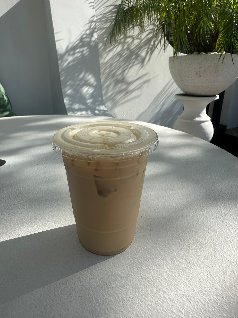 Iced Vanilla Latte at Raw & Juicy Rosemary Beach, Florida with balanced sweetness and espresso flavor.