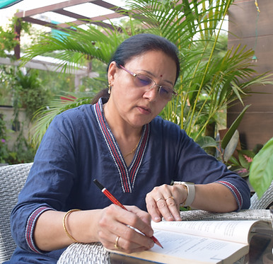 Dr. Gurminder Rawal studying