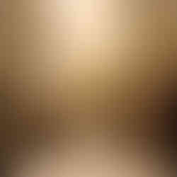 Carrara marble powder room vanity with decorative custom splash