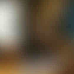 White Carrara marble countertops with an ogee edge in a scullery prep space designed for entertaining