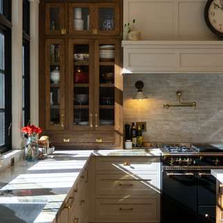 Calacatta Raffello marble kitchen countertops in a historic 1885 Wauwatosa home featuring dramatic veining and custom cabinetry