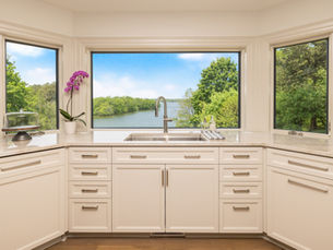 Bianco Perla Quartzite Kitchen Countertops on Okauchee Lake
