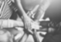 getting-it-done-through-teamwork-shot-group-creative-businesspeople-standing-with-their-ha