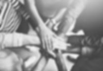 getting-it-done-through-teamwork-shot-group-creative-businesspeople-standing-with-their-ha