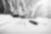 business-adviser-analyzing-financial-figures-denoting-progress-work-company_edited.jpg