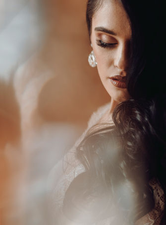 Bride with natural-toned makeup, featuring soft eyeshadow, light blush, and a delicate lip color by Andrea Palko Makeup Artist