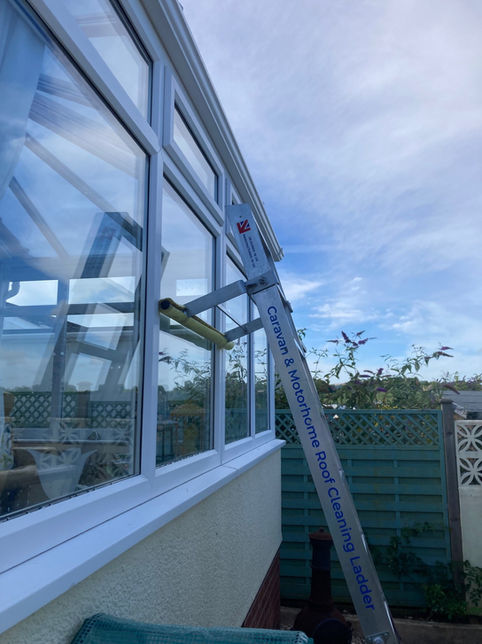 Conservatory Roof Cleaning Ladder. The most stable, comfortable and practical ladder for easy access to clean your conservatory roof.