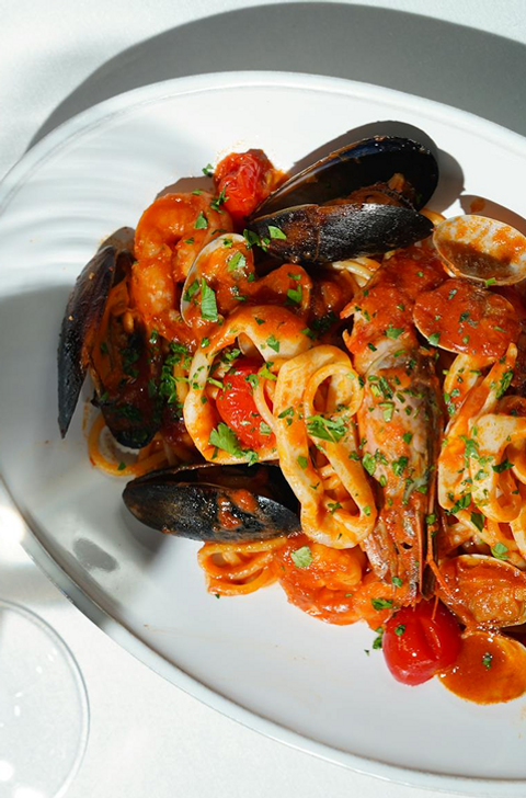 Seafood pasta with mussels, shrimp, clams, and tomato