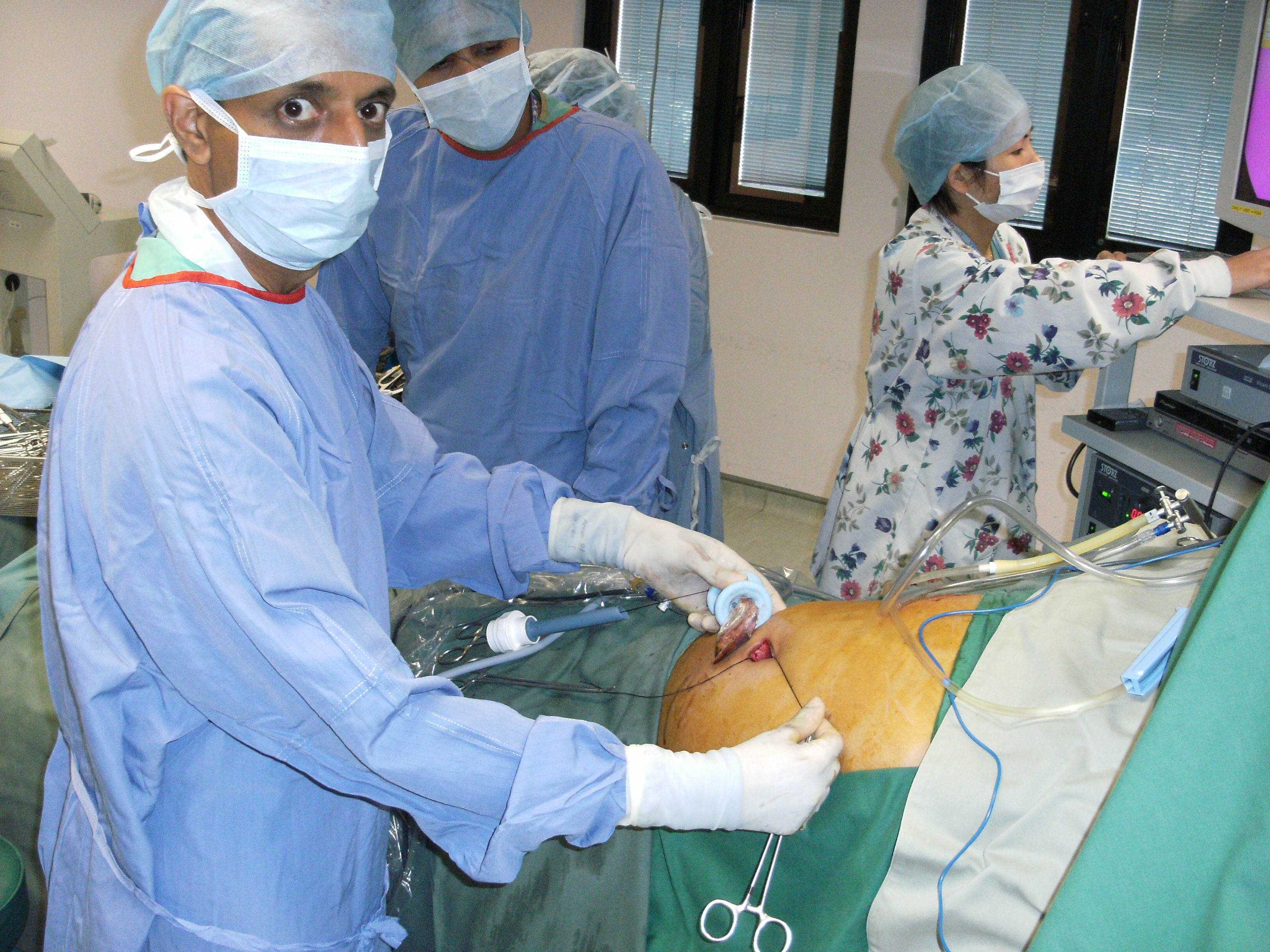 Gallbladder being removed in a bag