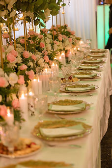 centerpieces candles greenery and blush